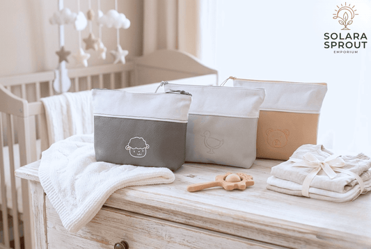 Premium baby leather essentials bag in tan — genuine Karoo leather nappy bag with embroidered details