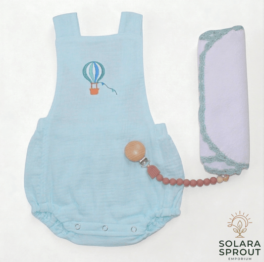 Hot Air Balloon Baby Muslin Romper in aqua with embroidered hot air balloon design, perfect for stylish little ones.